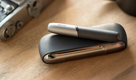 Man Holding IQOS 3 White