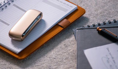 Man Holding IQOS 3 White