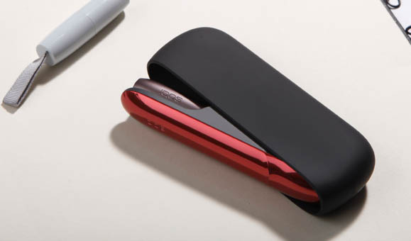 Man Holding IQOS 3 White