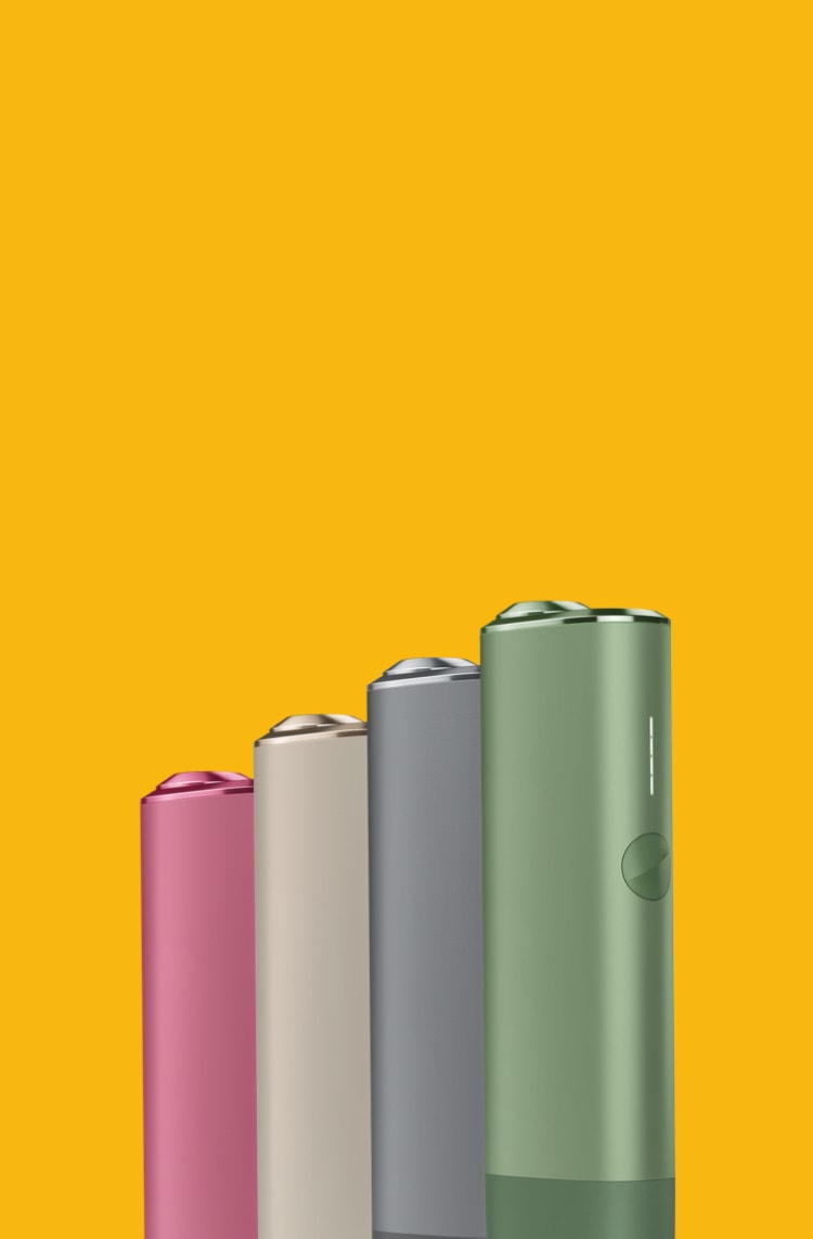 An IQOS ILUMA ONE™ devices in different colours.