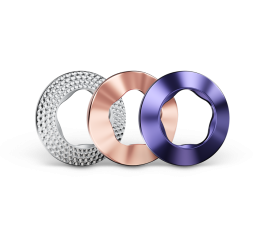 Conjunto de aros IQOS ILUMA i REMIX Edição Limitada: um prateado texturizado, um cor-de-rosa liso e um roxo liso.
